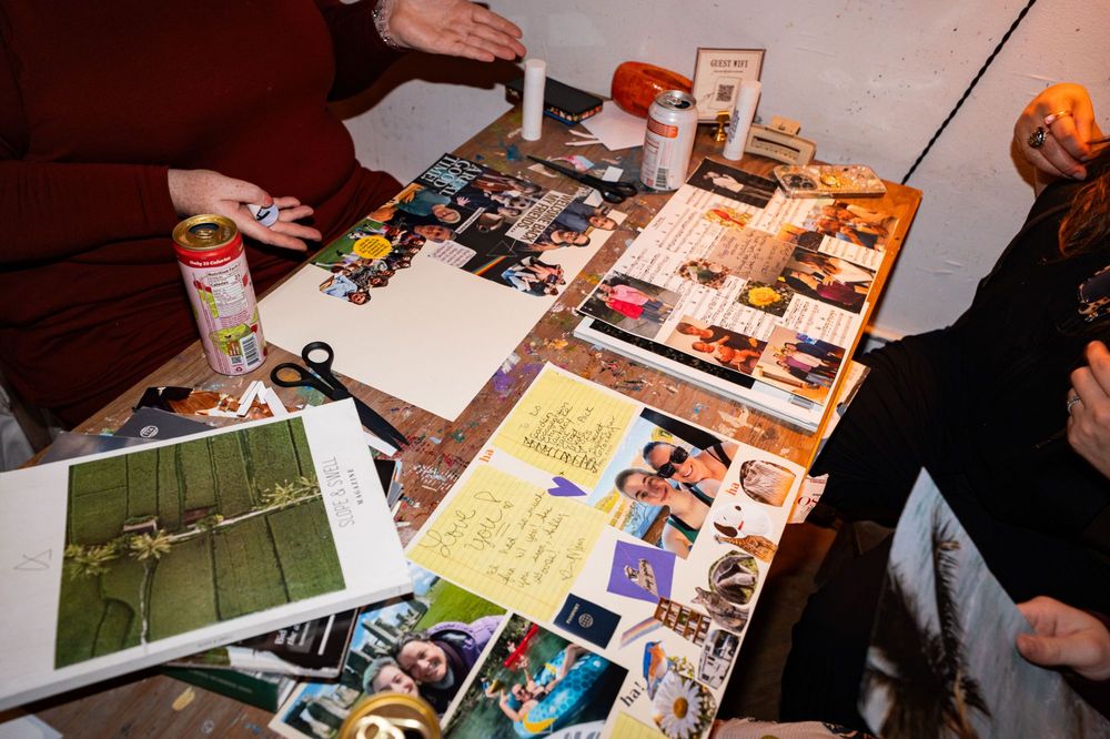 A handwritten note reading I love you, pasted among family photographs.